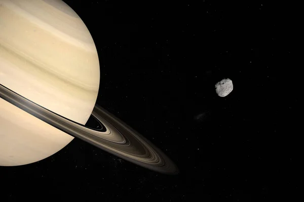 在外太空绕土星运行的贾纳斯卫星 3D渲染 — 图库照片