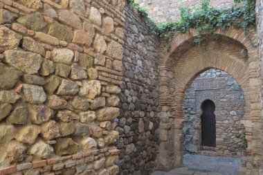 Tunnels and passageways in muslim fortification of La Alcazaba, Malaga, Spain clipart