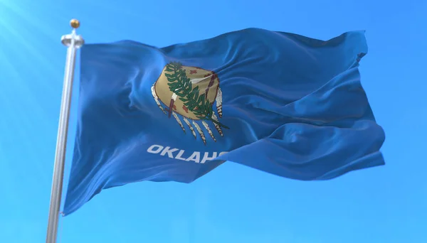 Amerika Birleşik Devletleri 'nin Oklahoma eyaletinin bayrağı, rüzgarda sallanıyor.