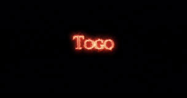 Togo Skrivet Med Eld Ögla — Stockvideo