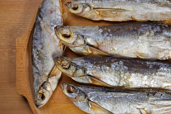 Torkade sabrefish. på bordet. — Stockfoto