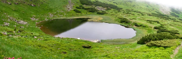 Highland lake in the Carpathian mountains. Nesamovyte lake, Ukra