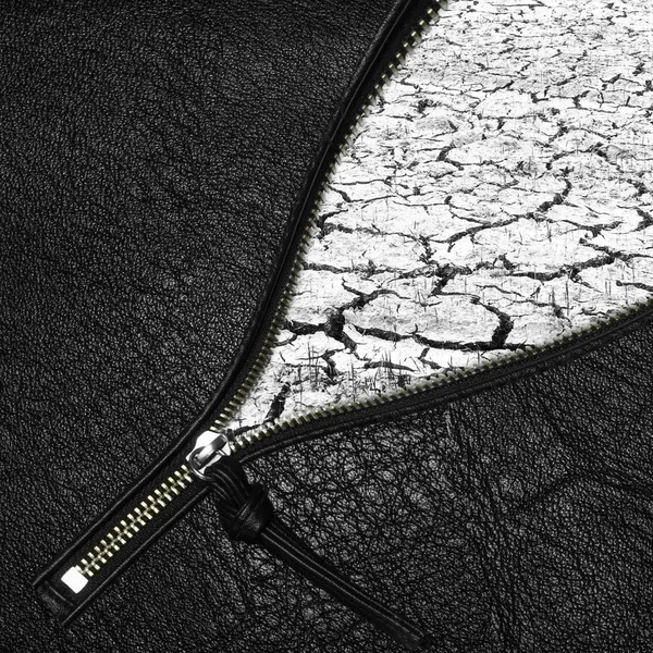 Opened zipper with cracked earth — Stock Photo, Image