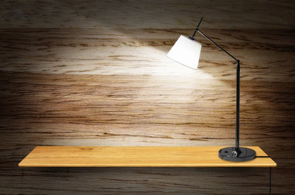 Lamp on wooden bookshelf — Stock Photo, Image