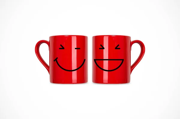 Rote lächelnde Kaffeetassen — Stockfoto