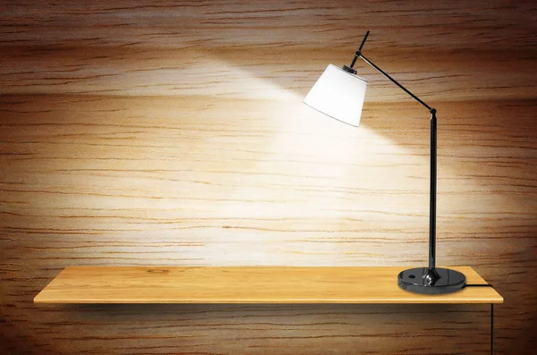 Lamp on wooden bookshelf — Stock Photo, Image