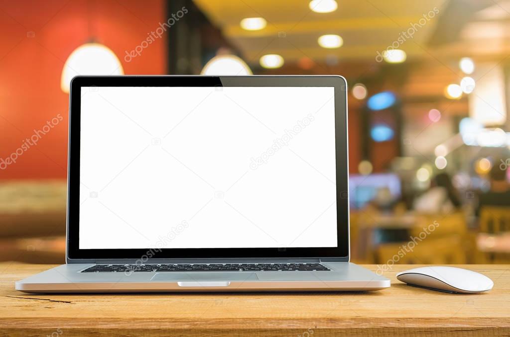  Laptop with blank screen on table