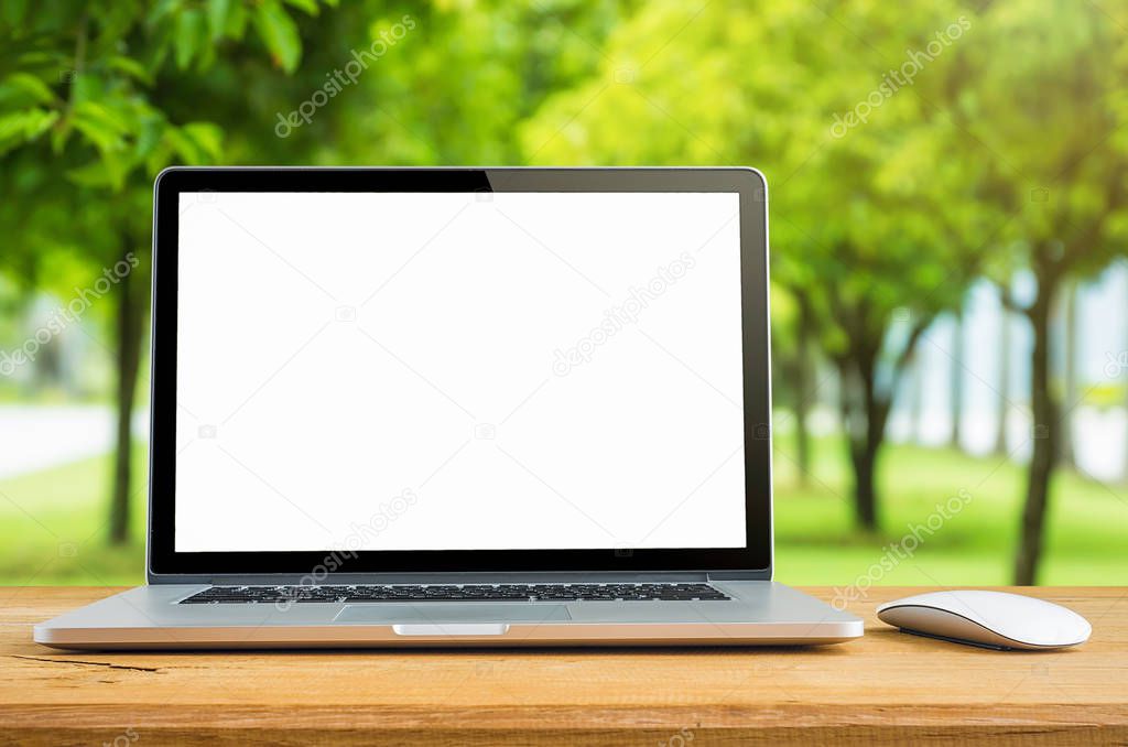  Laptop with blank screen on table 