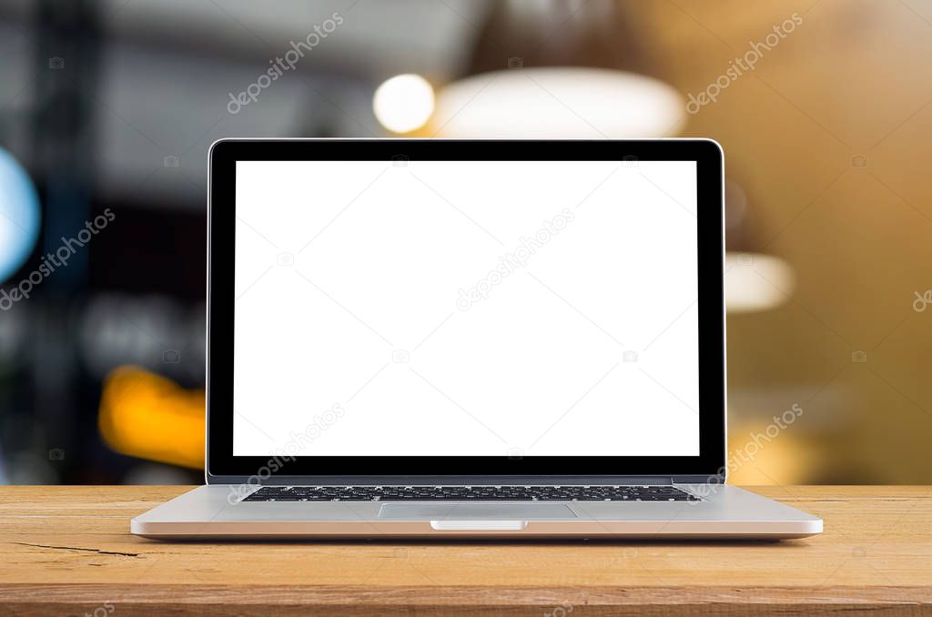  Laptop with blank screen on table 