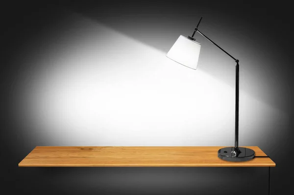 Lamp on wooden bookshelf — Stock Photo, Image