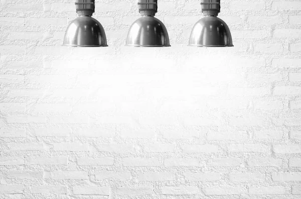 Wall illuminated by ceiling lamps — Stock Photo, Image