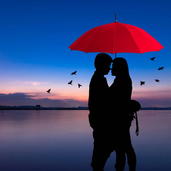 Silhouettes of romantic couple — Stock Photo, Image