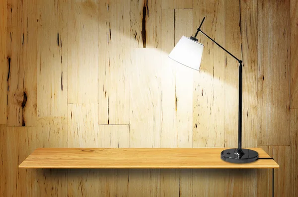 Lamp on wooden bookshelf — Stock Photo, Image