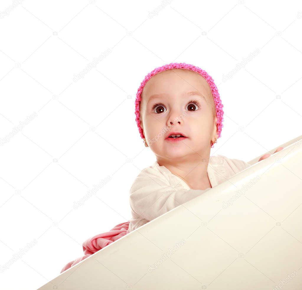 Surprised little baby on white background, looking up