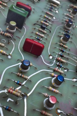 Electronics, close-up of accessories, Resistors, Resistors, Capacitors ...  clipart