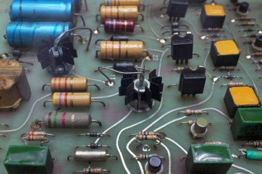 Electronics, resistors, capacitors, inductors, coils, background ... clipart