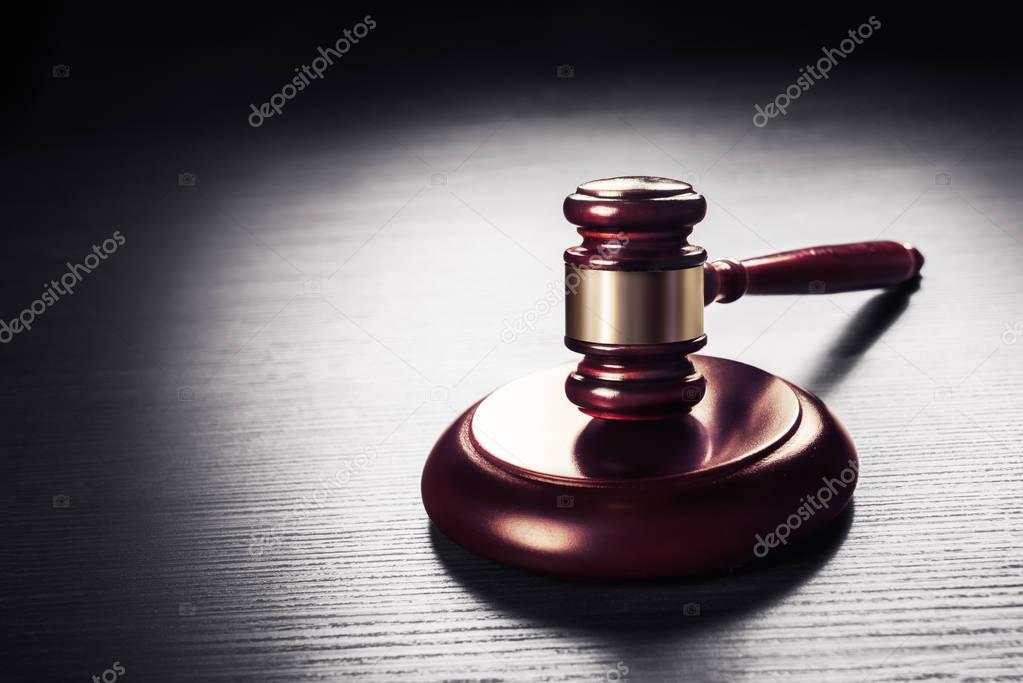 judge gavel on a black  wooden background