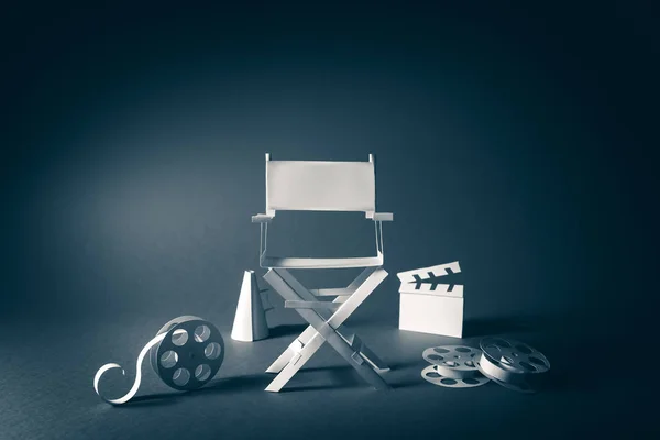 Image with vintage texture of a Director chair and movie items — Stock Photo, Image