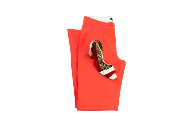 Red elegant woman trousers and an matching elegant female shoe o — Stock Photo, Image