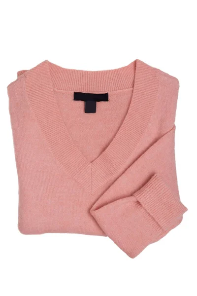 女性の服セーターは隔離された。折り畳まれた女性ピンクのクローズアップ — ストック写真