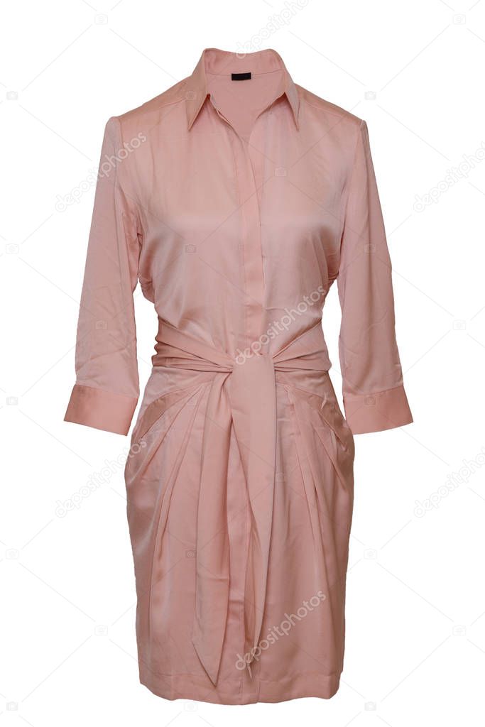Womans spring summer dress. Close-up of a light pink elegant sty