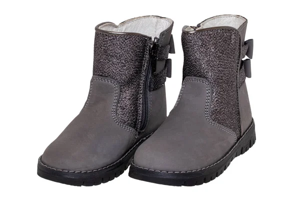Winter boots. Close-up of a pair elegant gray silver leather win — Stock Photo, Image