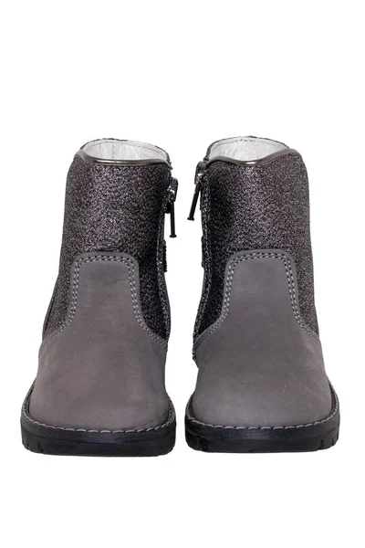 Winter boots. Close-up of a pair elegant gray silver leather win — Stock Photo, Image