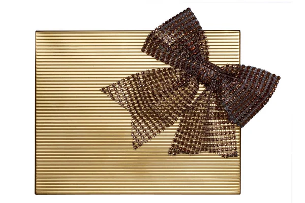 Ribbon bow card template. Closeup of a decorative festive golden