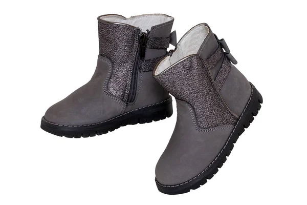 Winter boots. Close-up of a pair elegant gray silver leather win — Stock Photo, Image