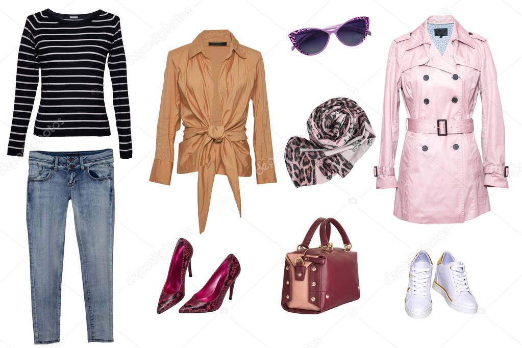 Set of a stylish and trendy women coat, a blouse or shirt, high heeles, a sweater, a handbag, a denim pants and other accessories isolated on a white background. Latest fashion trends.