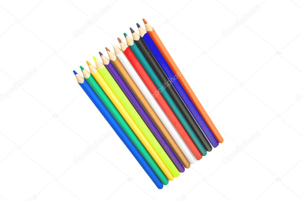 Colorful pencils or wooden crayons arranged in a row are isolated on a white background. Back to school and education concept.