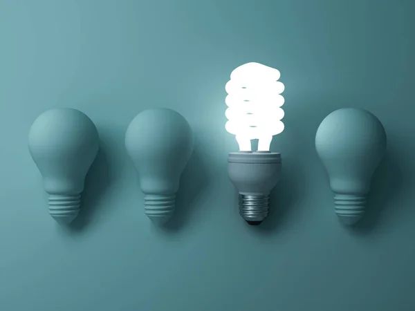 Eco energy saving light bulb one glowing fluorescent lightbulb standing out from unlit incandescent bulbs — Stock Photo, Image