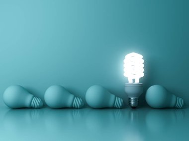 Enerji tasarruflu ampul, ölü akkor ampuller yeşil arka plan, bireysellik ve farklı yaratıcı fikir kavramı üzerinden dışarı ayakta bir parlayan floresan ampul