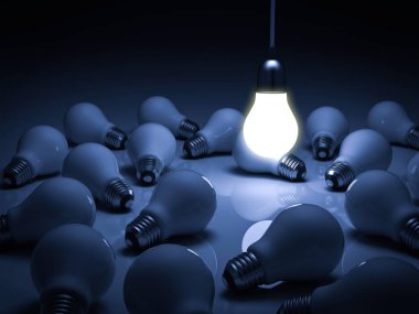 One glowing hanging light bulb standing out from the unlit dead incandescent bulbs with reflection , leadership and different business creative idea concept clipart