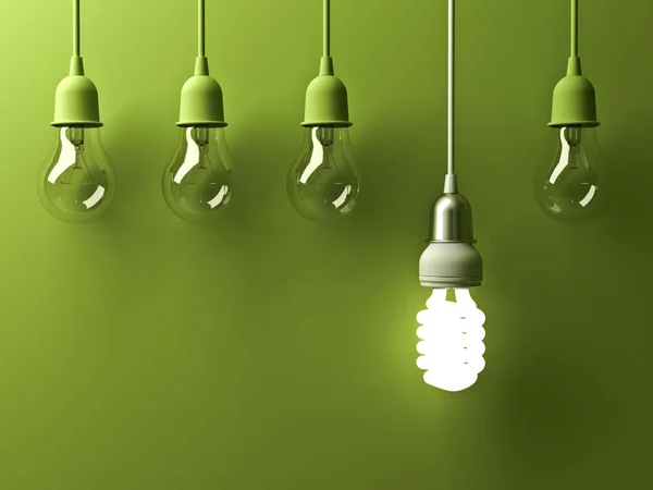 En hängande energisparande lampa glödande olika sticker ut från släckt glödlampor glödlampor med reflektion på grön bakgrund, ledarskap och olika kreativa idé koncept. 3D render — Stockfoto