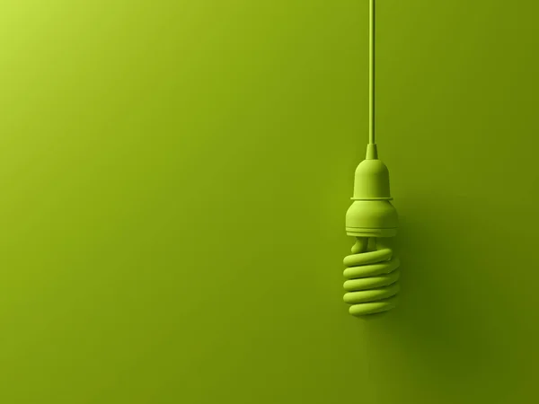 Verde eco risparmio energetico compatto lampadina fluorescente appesa isolata su sfondo verde con ombra, lo stesso concetto di idea creativa astratta colore. Rendering 3D — Foto Stock