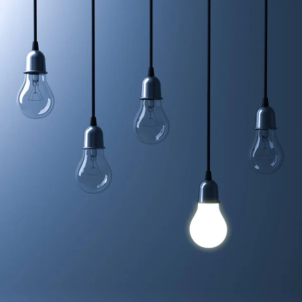 One hanging light bulb glowing different and standing out from unlit incandescent bulbs with reflection on dark blue background , leadership and different business creative idea concept. 3D render — Stock Photo, Image