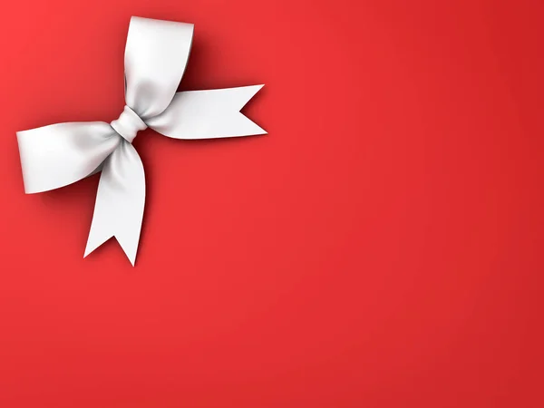 White gift ribbon bow isolated on red background — Stock Photo, Image