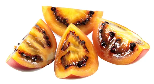 Sliced tamarillo (tree tomato) fruit isolated on white background — Stock Photo, Image
