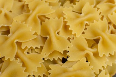 Fiyonk şeklinde biraz farfalle makarnasının arka planı. desen