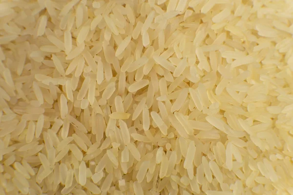 Long grain fond de riz blanc. Macro. Texture de riz. Vue du dessus — Photo