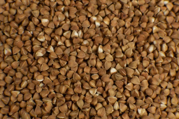 Fondo y textura del trigo sarraceno. Alforfón asado. Decorar. Ingrediente. Productos dietéticos . —  Fotos de Stock