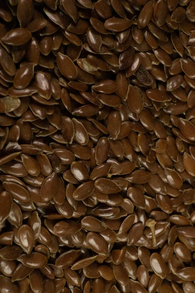 Brown Flax seed. Also known as Linseed, Flaxseed and Common Flax. Closeup of grains, background use. — Stock Photo, Image