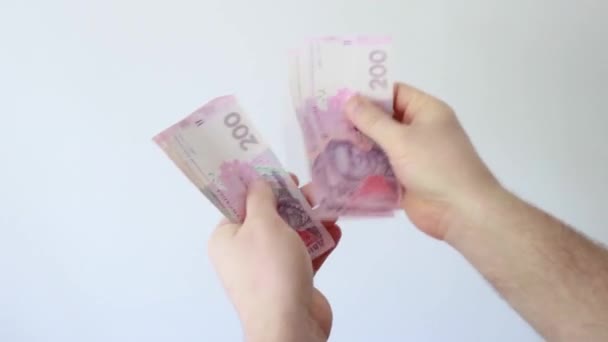 Man Indoors Counts Money Holding Them His Hands — Stock Video