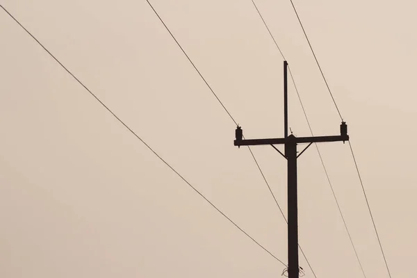 Concrete Electric Pole Standing Cloudy Sky Silhouette — Stock Photo, Image