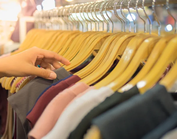 Wooden Clothes Hanger Woman Hand Choosing Boutique Shirt Modern Shop — стоковое фото
