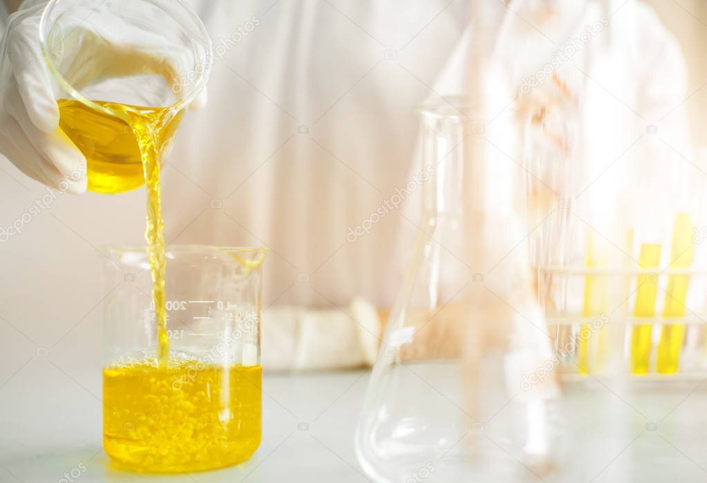 Oil pouring, Formulating the chemical for medicine,Laboratory research, dropping liquid to test tube