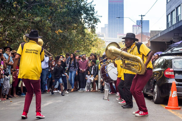 Johannesburg, South Africa, April 29-2018: Buskers playing on the streets. Brass band performing in the city.