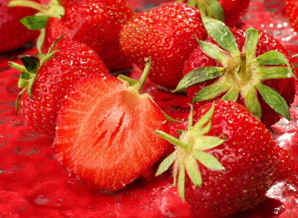 Strawberry background with slice — Stock Photo, Image