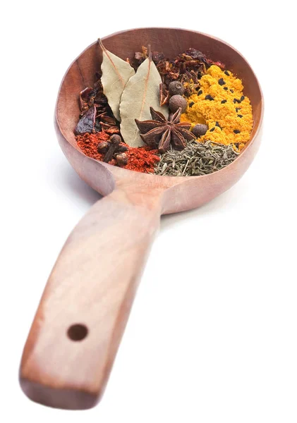 Spice in wood spoon — Stock Photo, Image